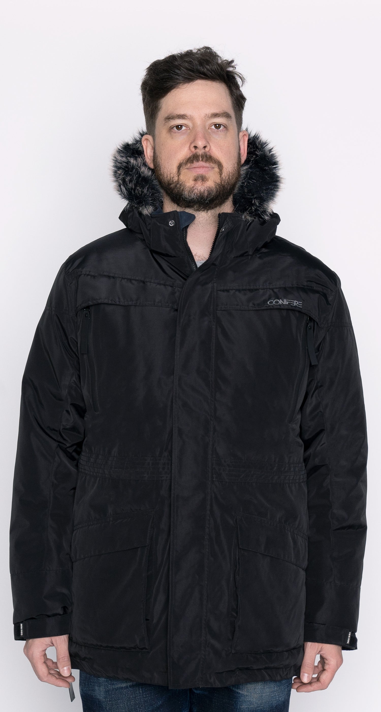 Durable men's parka designed for peak winter performance. Water resistant shell, wind stopper panel, detachable faux fur hood, quilted fleece lining, adjustable cuffs, YKK zipper, functional pockets.